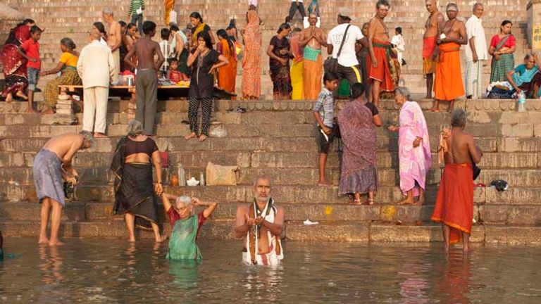 After bathing in the ghats, many Hindus go to one of Varanasi’s many temples to pray. // © 2014 Mindy Poder