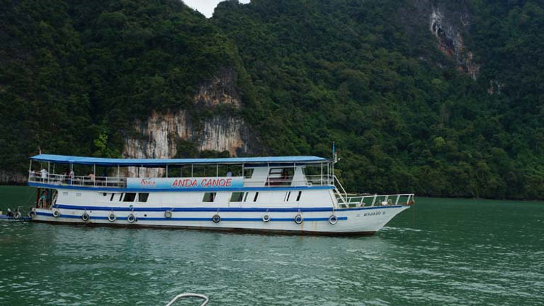 Larger boats take visitors from Phuket to the smaller islands of the bay. // (c) 2013 Deborah Dimond