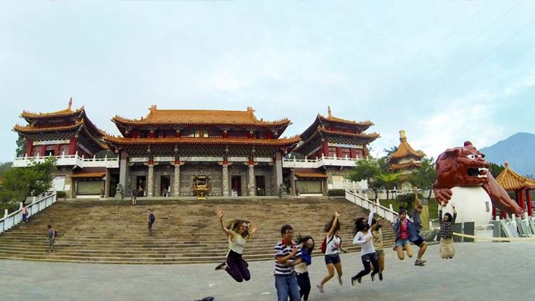 The Wenwu Temple features two stone vermillion lions at the front of the plaza and is a popular attraction for visitors to the area. // © 2014 Tyler Knowles