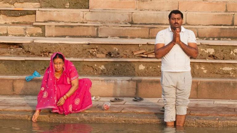 Hindus hope that their ashes are released in the Ganges River at Varanasi, though many also travel here to perform their ritual ablutions each morning. // © 2014 Mindy Poder
