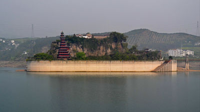 Shibaozhai, nicknamed the bonsai tree of the Yangtze River, is a popular river cruise excursion. // © 2013 Mindy Poder
