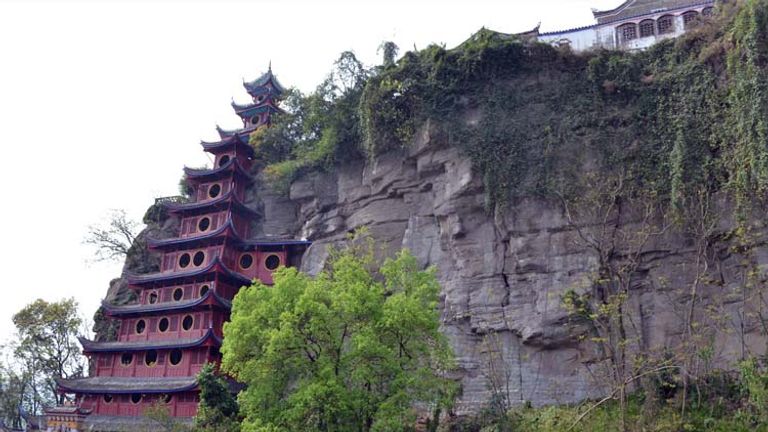 Shibaozhai’s pagoda was built without nails and was designed to lean against the length of the rock. // (c) 2013 Mindy Poder