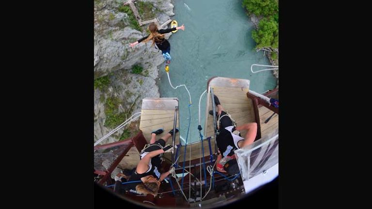 Queenstown’s Kawarau Bridge Bungy is a 143-foot drop and the first-ever commercial bungee site. // © 2014 AJ Hackett