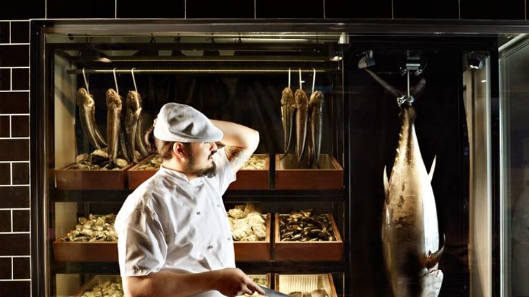 Gilt overlooks the Gowings Bar & Grill, a European-style brasserie and open kitchen equipped with a wood-fired oven and a wood rotisserie. // © 2014 QT Sydney