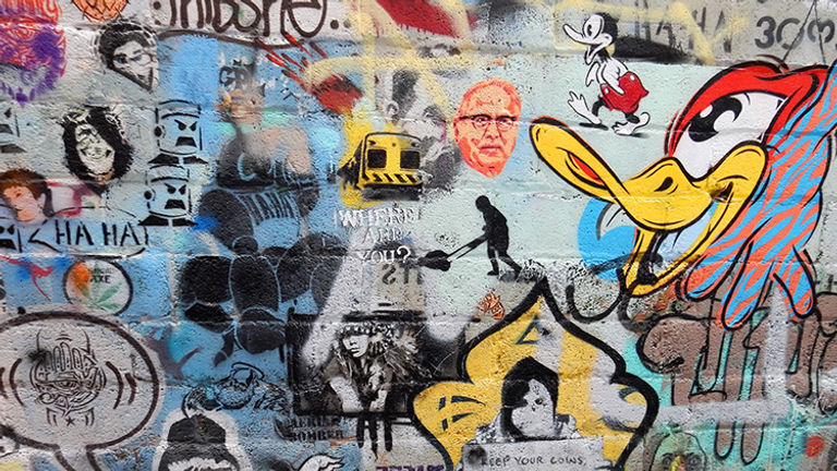 Melbourne’s street art is diverse and includes cartoons, human faces, political statements, graffiti and more. // © 2015 Shane Nelson