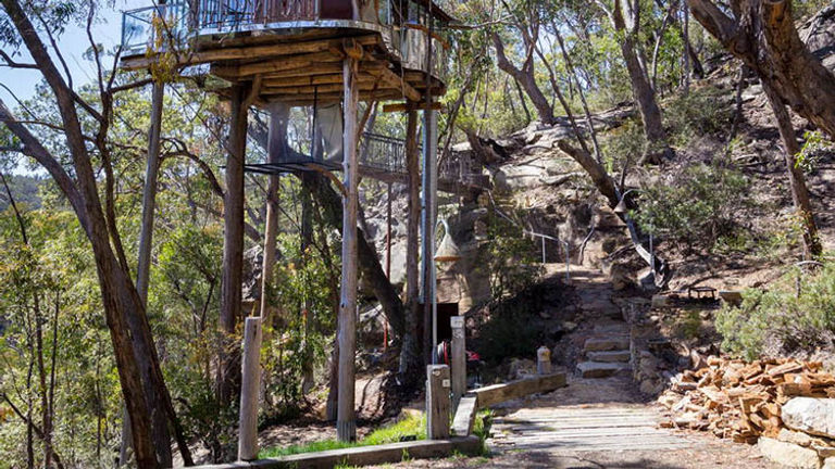 A drive away from Sydney, the Blue Mountains wilderness hosts Love Cabins, a property that includes this unique treetop cabin. // © 2016 Love Cabins