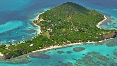 Petit St. Vincent is a private island and resort in the Caribbean, offering 115 acres of tropical woodland and white sand beach. // © 2014 Petit St. Vincent