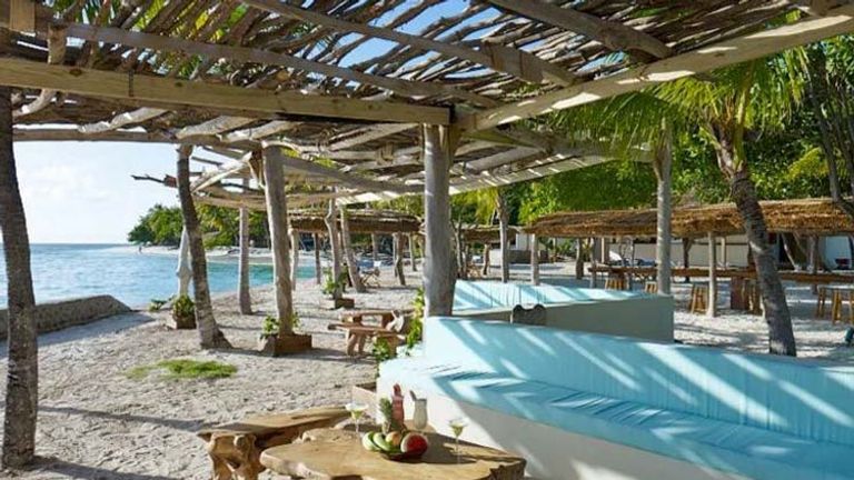 Goatie’s spacious lounge in the sand encourages guests to spend a good part of the day here. // © 2014 Petit St. Vincent