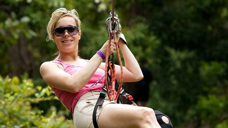 Soar through the jungle at the Fly Zone in the Loterie Farm Hidden Forest, St. Martin. // © 2013 Mark Edward Harris