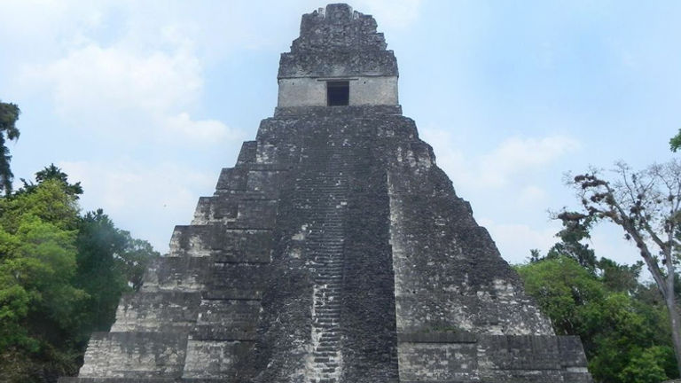 Tikal Temple I, Temple of the Great Jaguar, is a Guatemala icon wherein lies Ah Cacao, one of the great Maya rulers. // (c) 2013 ASTA YPS