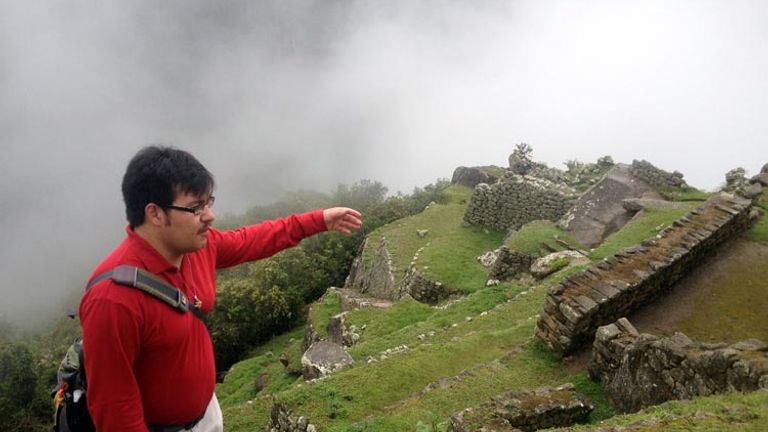 On Globus' Peru Splendors itinerary, guides provide important context to Incan ruins. // (c) 2013 Kenneth Shapiro
