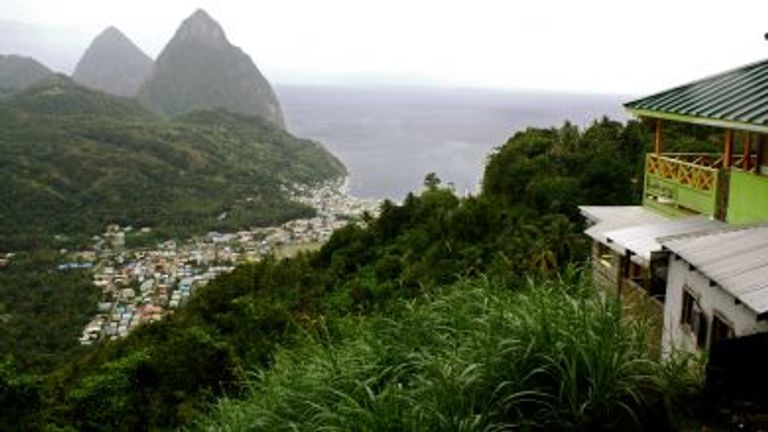 A rainy day in St. Lucia doesn’t detract from the beauty of the Pitons, two volcanic plugs that are also a UNESCO World Heritage Site. // © 2012 Elizabeth Wallace