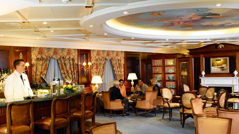 Before: The dining room bar // © 2014 Oceania Cruises