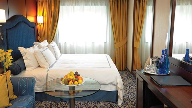 Before: Regatta’s Deluxe Ocean View Stateroom // © 2014 Oceania Cruises