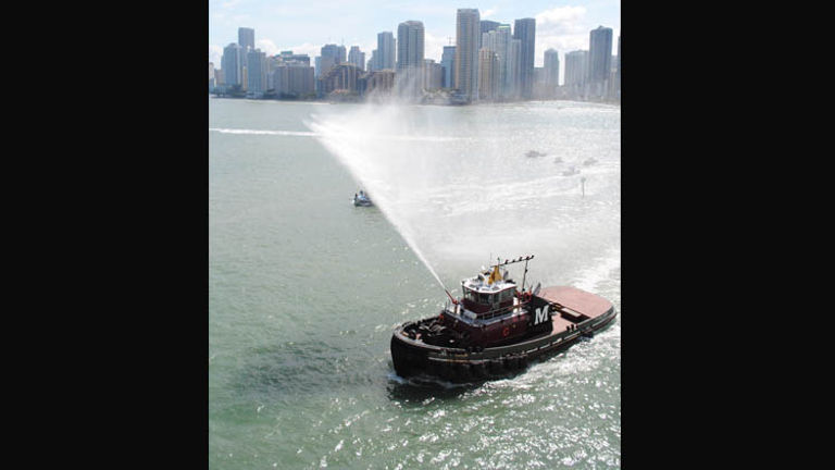 While staff popped champagne bottles, escort boats shot celebratory water cannons. // © 2016 Mindy Poder