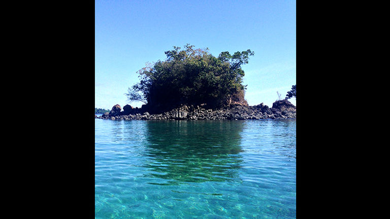 Paddleboarding in the clear, turquoise waters off Isla de Coiba was a highlight of the private event. // © 2016 Michelle Juergen