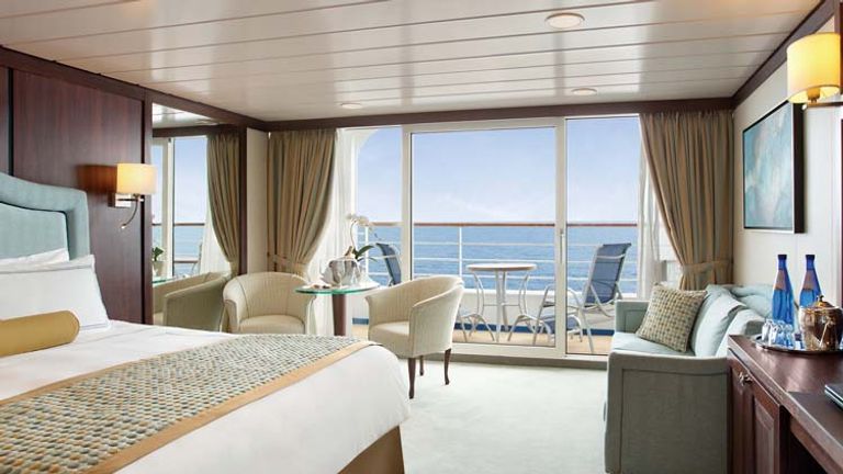 After: All 52 Penthouse Suites now feature new furnishings and a gold and blue color scheme intended to echo the sun and sea theme found on Oceania’s Riviera and Marina ships. // © 2014 Oceania