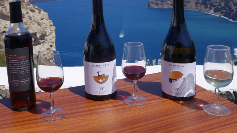 Guests can enjoy drinks with a view at Santorini’s Venetsanos Winery. // © 2016 Tim Johnson