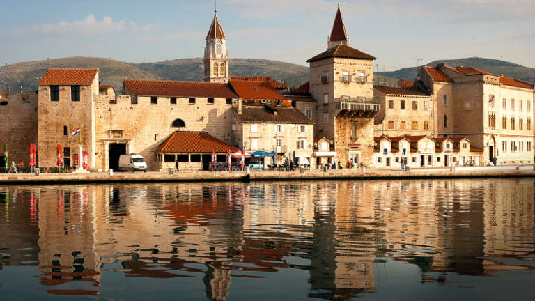 Croatia offers visitors the charm and history of Europe, but also a bit of quiet solitude. The historic town of Trogir, near Split, offers a beautiful old town and a slower pace. // © 2016 iStock