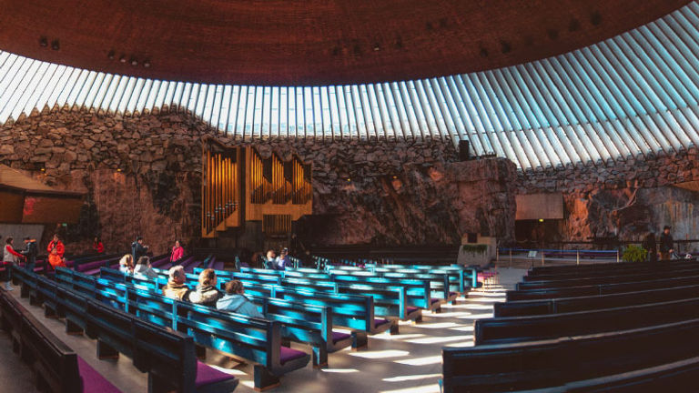 Finland’s Temppeliaukio church is commonly called the “Rock Church” because its walls are made entirely out of the rugged rock found underground in the area. // © 2017 iStock