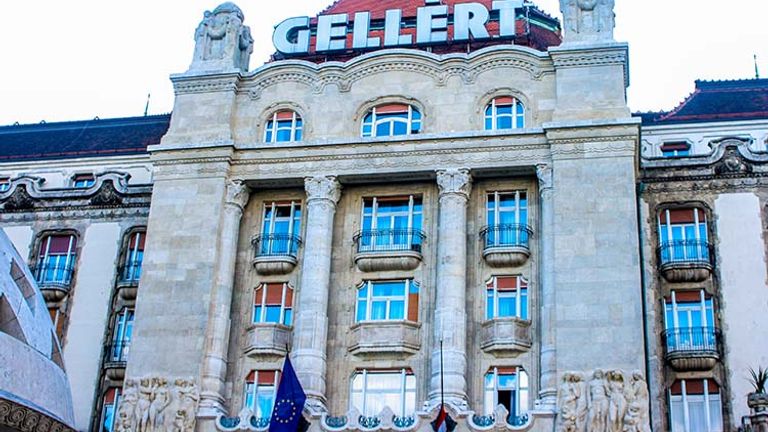 The front entrance of Gellert has access to the adjoining upscale hotel, which is visible from Liberty Bridge. // © 2016 Josalin Saffer