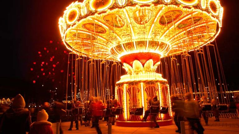 The merry-go-round is a popular ride a Tivoli Gardens, one of the world’s oldest amusement parks and located in the middle of Copenhagen. // © 2014 Tivoli Gardens