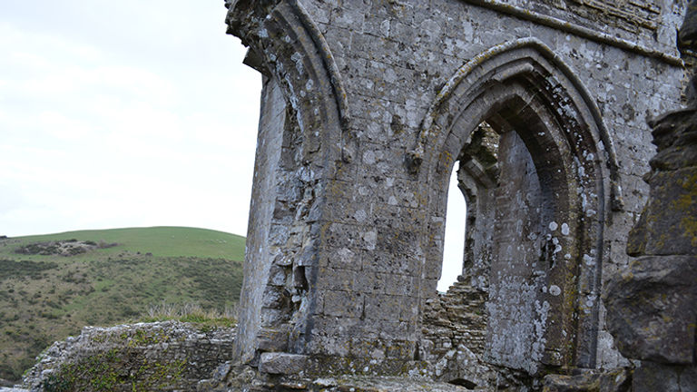 Corfe Castle’s slanted ruins are the result of explosions set off by Parliamentarian forces during the English Civil War. // © 2015 Melissa Karlin