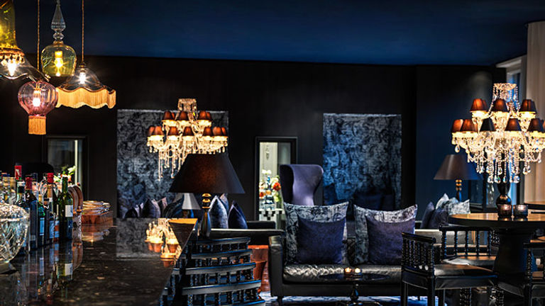 Bluespoon Bar overlooks the canal and offers bar food, nonalcoholic drinks such as tea, craft cocktails and more. // © 2016 Andaz Amsterdam, Prinsengracht