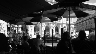 Literary greats such as Oscar Wilde could often be found in the cafes and bars of Paris, including Cafe de la Paix, where patrons also have a view of the famous Palais Garnier opera house. // © 2014 Creative Commons user solapenna