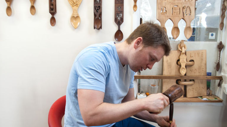 A short drive from Tenby, Wales, is the Lovespoon Workshop, a family-run business that sells hand-crafted lovespoons and teaches about the tradition. // © 2014 Mindy Poder