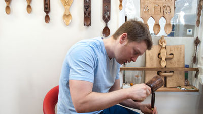 A short drive from Tenby, Wales, is the Lovespoon Workshop, a family-run business that sells hand-crafted lovespoons and teaches about the tradition. // © 2014 Mindy Poder