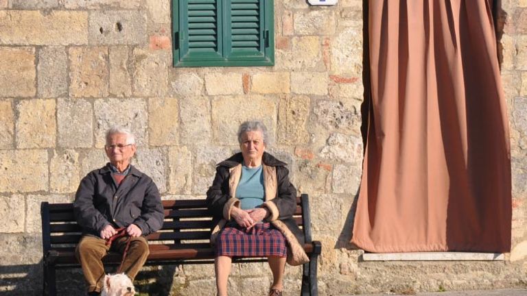 Couple in Monteriggioni, Italy, Third Place, 2014 TravelAge West reader photo contest // © 2014 Laurel Leidner