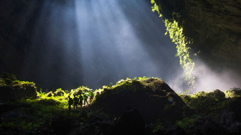 The Son Doong cave is so large that a block of skyscrapers could fit within its massive chambers. // © 2016 Oxalis Adventure Tours/Thuan Thang