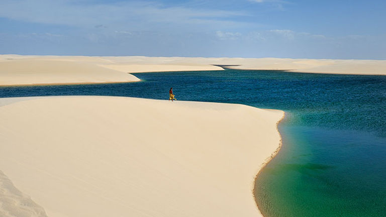 Explore the dunes and lagoons of the national park — the result of a six-month-long rainy season — on foot. // © 2016 iStock