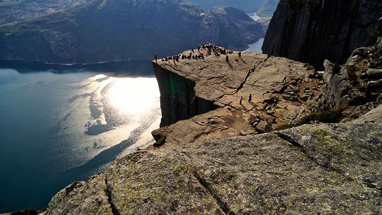 Preikestolen (Pulpit Rock) stands 1,981 feet tall in Norway's south Ryfylke district. // © 2016 Andreas Gruhle/VisitNorway.com