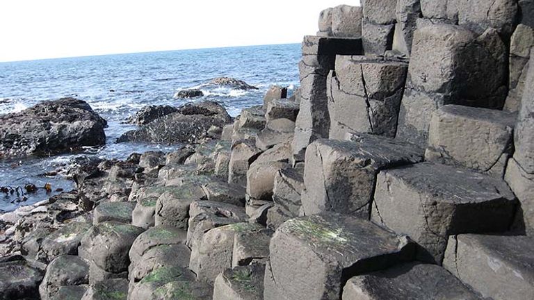These five beaches are far from ordinary, including Giant’s Causeway in northern Ireland, which is made up of thousands of basalt towers. // © 2017 Wikimedia Commons