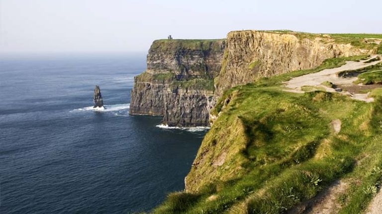 Five miles wide and more than 700 feet tall, the Cliffs of Moher is one of Ireland’s most visited sites. // © 2014 christobolo/Thinkstock