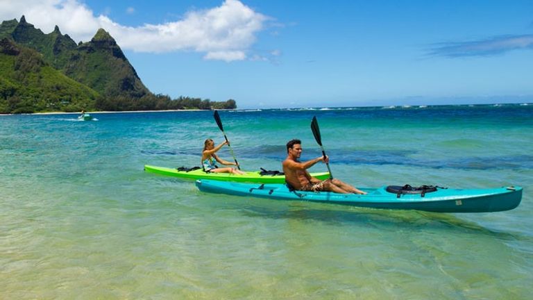 Active travelers need to look no further than Kauai, where lush natural surroundings allow for ample water-based and land adventures. // © 2014 HTA/Dana Edmunds