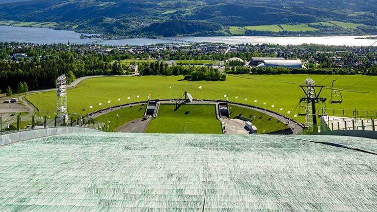 The view from the top of Lysgardsbakkene Ski Jumping Arena in Lillehammer, Norway, gives you a taste of what  winter athletes experience. // © 2018 Creative Commons user con4tini