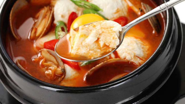 The broth of this tofu soup can be ordered at varying levels of spiciness, from mild to extra hot. // © 2014 Thinkstock