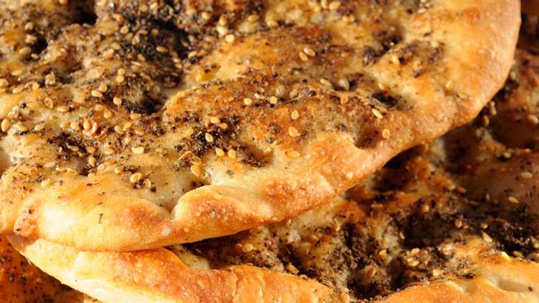 Similar to pizza, this Middle Eastern spiced flatbread can be sliced or folded. // © 2014 Thinkstock