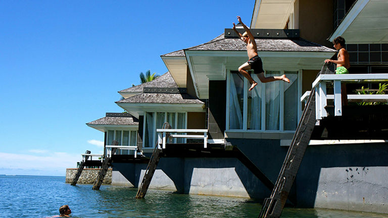 Koro Sun Resort's Edgewater Villas allow children to jump right into the water. // © 2014 Koro Sun Resort