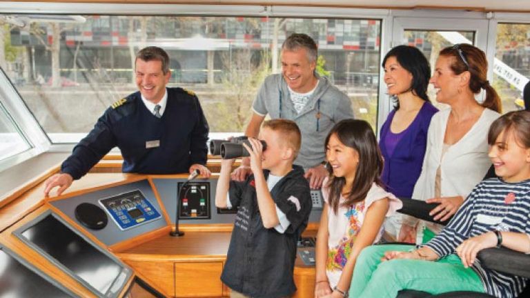 Family-friendly departures by Uniworld Boutique River Cruise Collection might include a visit to the captain’s seat. // © 2015 Uniworld Boutique River Cruise Collection