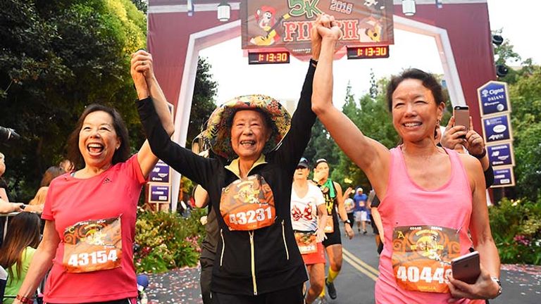 Anaheim, Calif., runner Ellen Lem — who, at 90 years old, is one of the oldest runners to ever participate in a Disneyland Half Marathon Weekend — ran the 5K along with her two daughters. // © 2017 Disneyland Resort