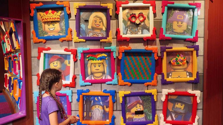 Jester’s Joke Corner in Dragon's Den features silly Lego portraits.