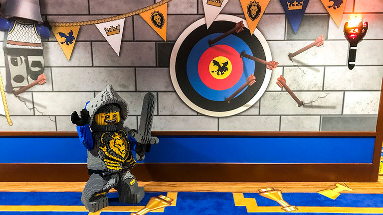 A Lego knight welcomes guests to Legoland Castle Hotel.