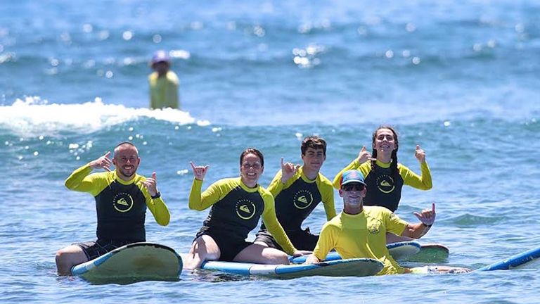 Friends and family can book group lessons with the experts at Royal Hawaiian Surf Academy. // © 2016 Royal Hawaiian Surf Academy