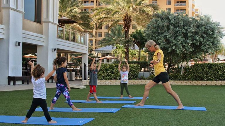 Yoga classes are offered for children. // © 2016 Sandpearl Resort Clearwater Beach