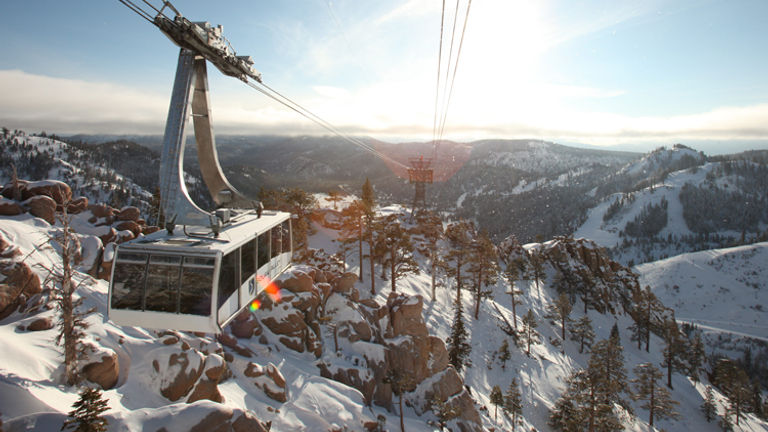Squaw's scenic aerial tram brings guests to the eateries and sights of High Camp at 8,200 feet. // © 2015 Trevor Clark