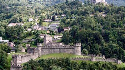 Bellinzona, Switzerland, is home to a trio of castles; from Castelgrande, the largest of the three, guests can see castle Montebello (bottom) and castle Sasso Corbaro (top). // © 2014 Marlynn Schotland